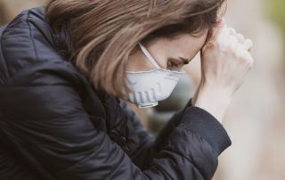 stressed woman with facemask